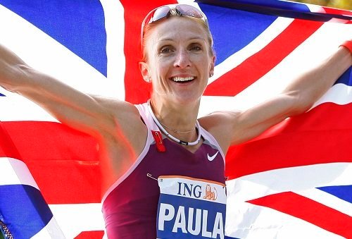 Paula Radcliffe of England holds the Union Jack after winning the Women's division of the 2008 New York City Marathon in New York November 2, 2008. REUTERS/Shannon Stapleton (UNITED STATES)